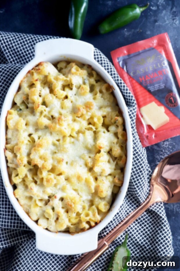 Overhead shot of a full baking dish of baked mac and cheese, ready to serve