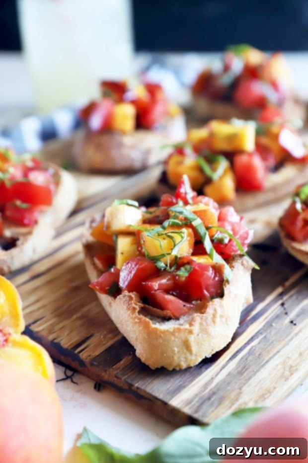 Summer Peach Tomato Bruschetta 2 Summer tomato peach bruschetta on platter photo, vibrant and fresh