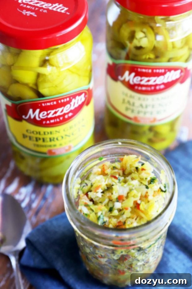 Zesty Pepperoncini Relish 2 Picture of homemade pepperoncini relish in a mason jar