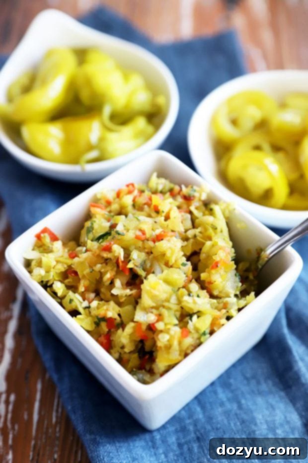 Zesty Pepperoncini Relish 3 Side view of fresh pepperoncini and jalapeño peppers in a bowl