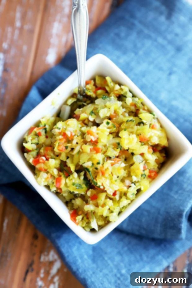 Zesty Pepperoncini Relish 6 Relish in a bowl with a spoon, overhead image