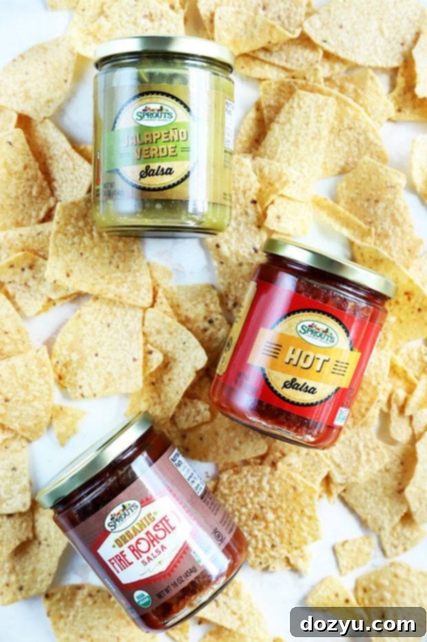 Epic Game Day Grazing Board 6 Variety of Sprouts salsa flavors displayed on a table