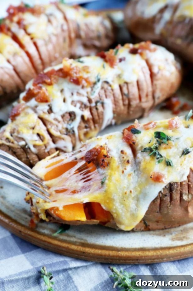 Sweet & Savory Maple Bacon Cheesy Hasselback Sweet Potatoes 3 Cheese pull potatoes photo