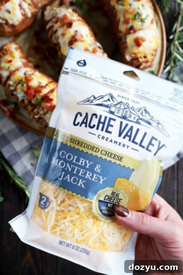 Sweet & Savory Maple Bacon Cheesy Hasselback Sweet Potatoes 4 Hand holding Cache Valley Cheese bag image