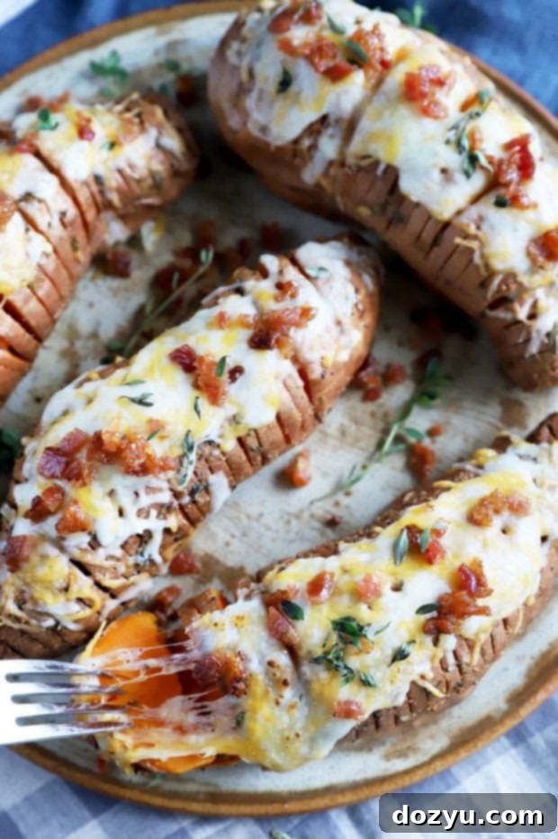 Sweet & Savory Maple Bacon Cheesy Hasselback Sweet Potatoes 6 Overhead photo of cheesy potatoes