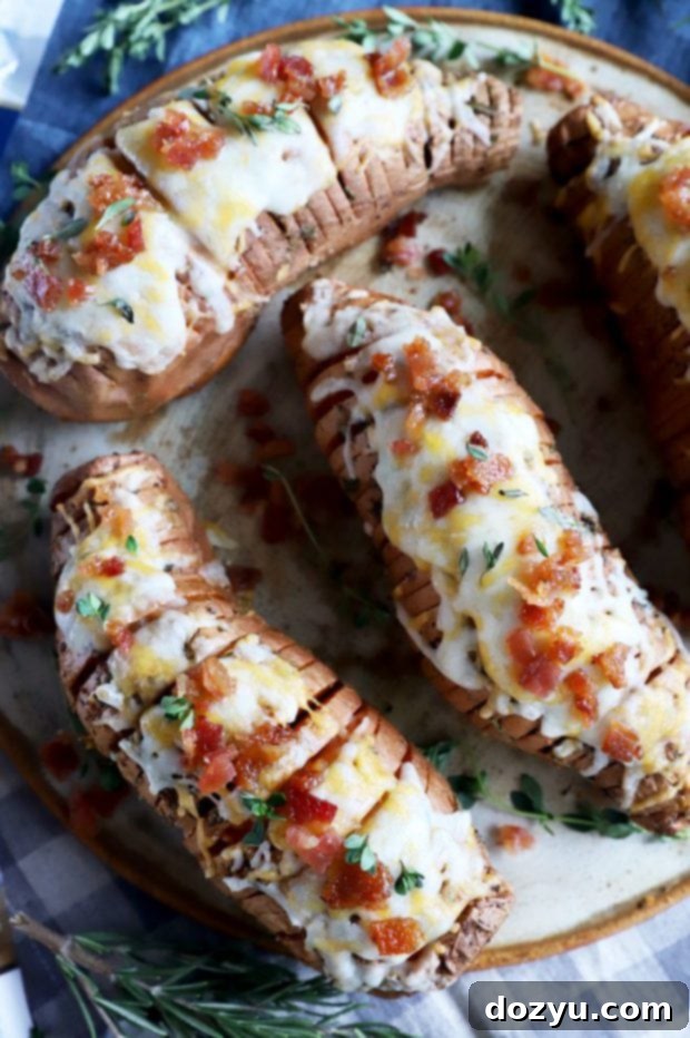 Sweet & Savory Maple Bacon Cheesy Hasselback Sweet Potatoes 9 Overhead photo of hasselback potatoes