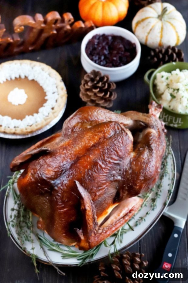 My Go-To Thanksgiving Gear 2 A beautifully smoked, beer-brined turkey, golden brown and ready for carving, emphasizing the success of using the right kitchen tools for a perfect Thanksgiving feast.