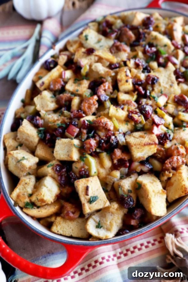 My Go-To Thanksgiving Gear 3 A savory Thanksgiving side dish of caramelized onion, apple, and sausage stuffing, highlighting the versatility of essential baking dishes and prep tools.