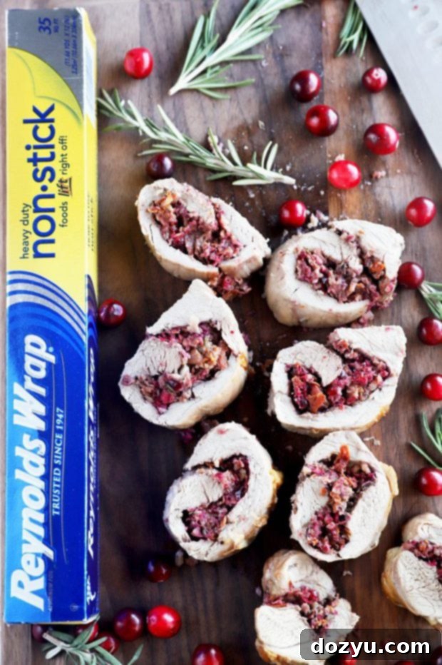 Festive Sheet Pan Stuffed Pork Tenderloin 2 Reynolds Wrap pork tenderloin image