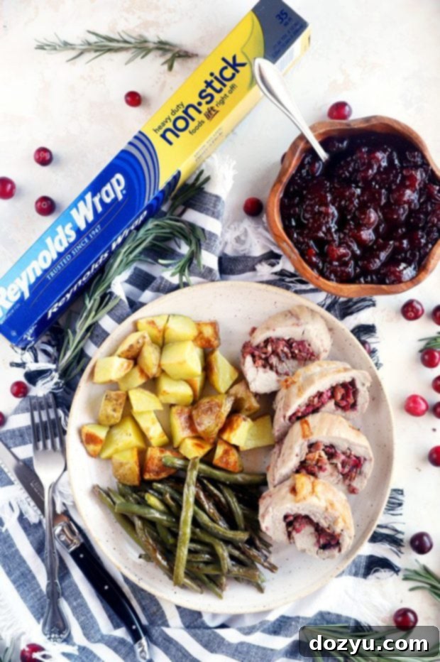 Festive Sheet Pan Stuffed Pork Tenderloin 4 Reynolds Wrap pork tenderloin image