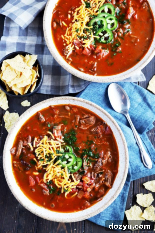 Tender Instant Pot Carne Asada Chili 3 Instant Pot carne asada chili in bowls picture