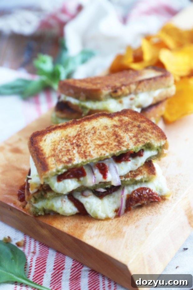 Pesto Grilled Cheese: Two Irresistible Twists 2 Grilled cheese picture on board with chips