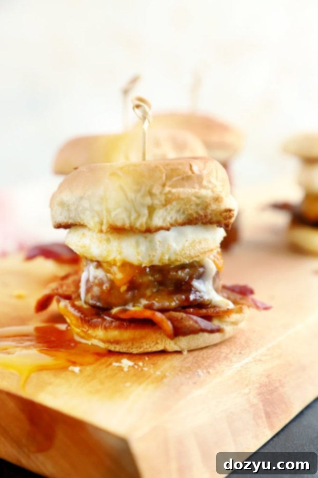 Cheesy BBQ Breakfast Pull-Aparts 4 Close-up of a breakfast slider showing a perfectly runny egg yolk