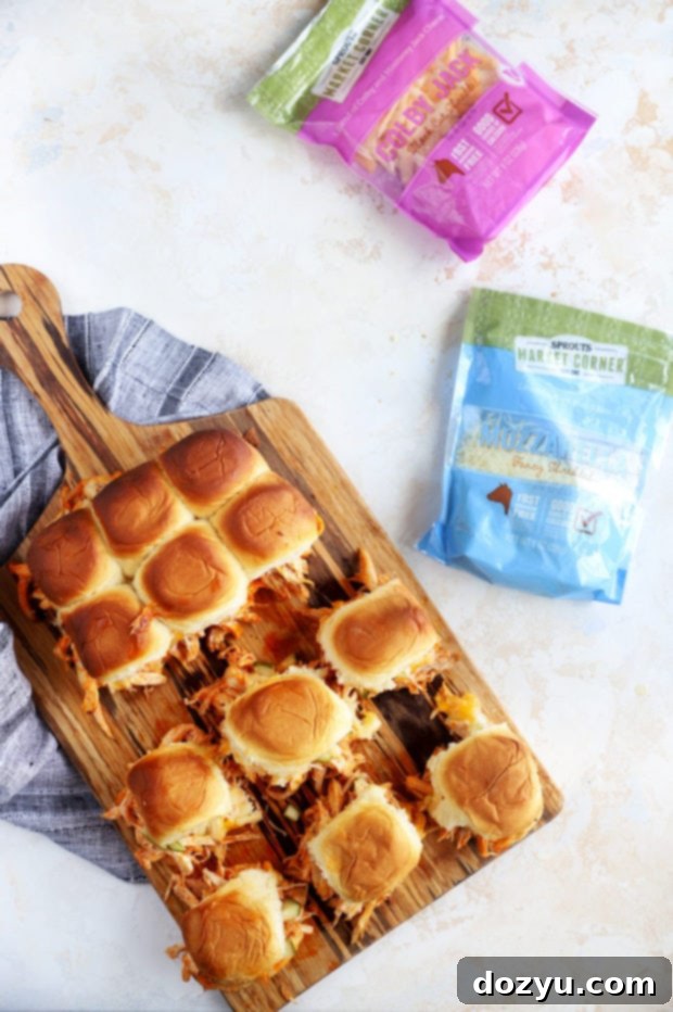 Chicken sliders on board with cheese image