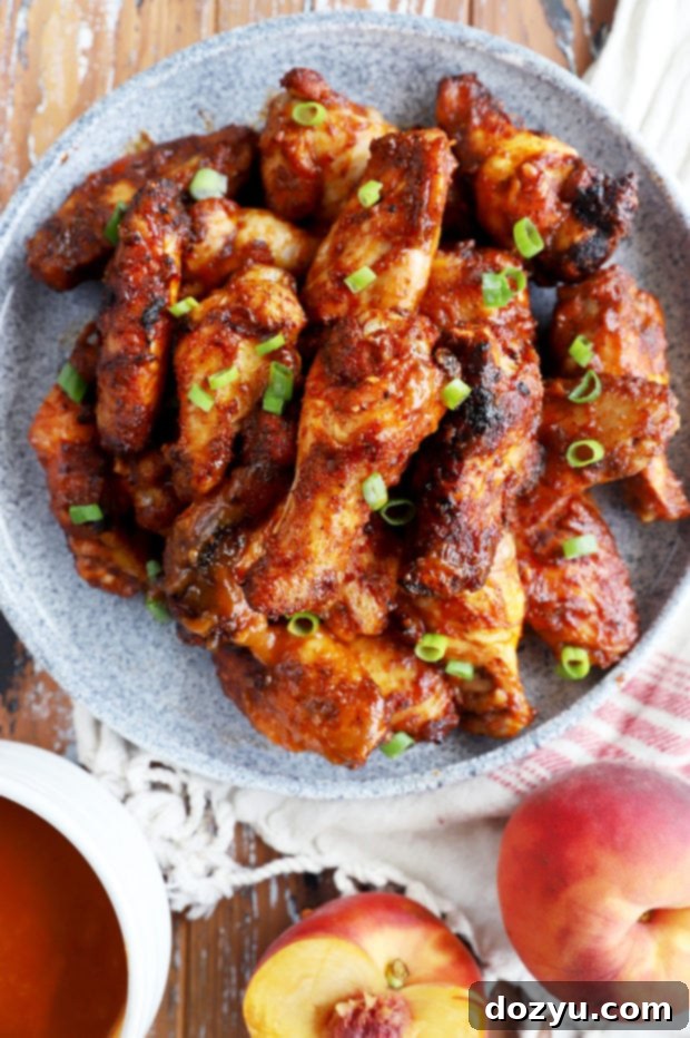 Sticky Bourbon Peach BBQ Wings 9 Overhead image of bbq wings on a platter