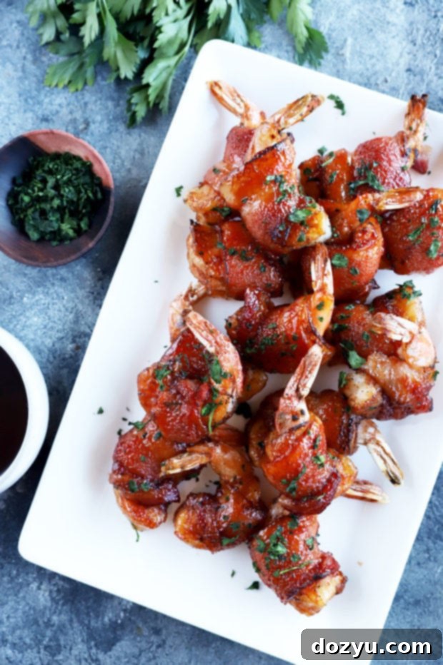 Smoky Bacon Wrapped Shrimp 8 Overhead image of BBQ shrimp on platter