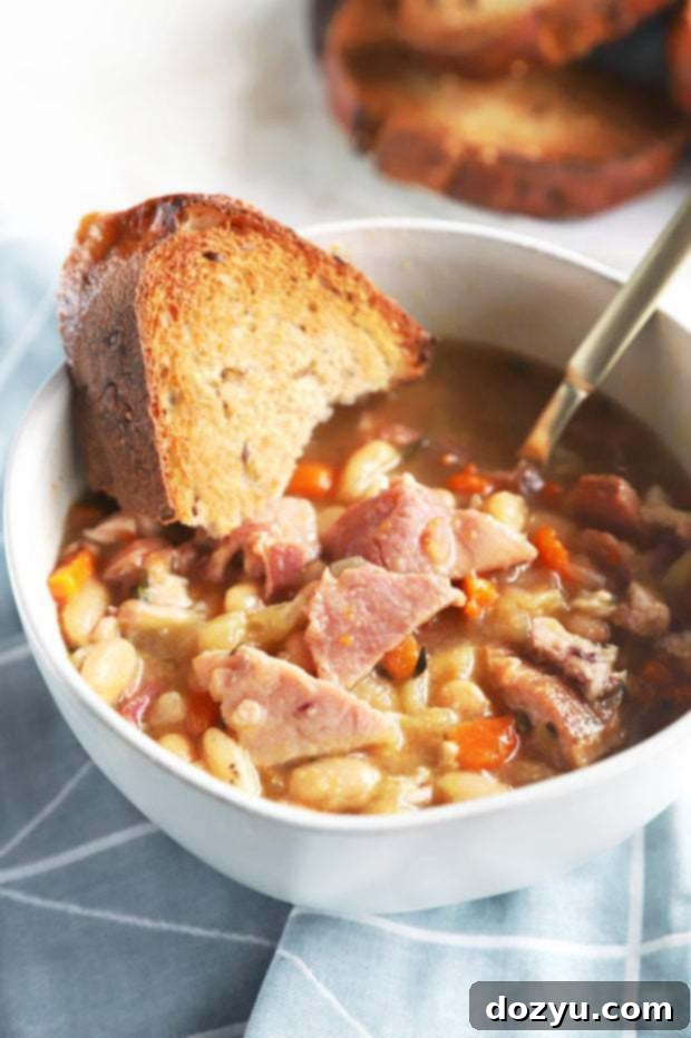 One Pot Ham and Bean Delight 8 A beautiful shot of Instant Pot Ham and Bean Soup in a bowl, ready to be enjoyed.