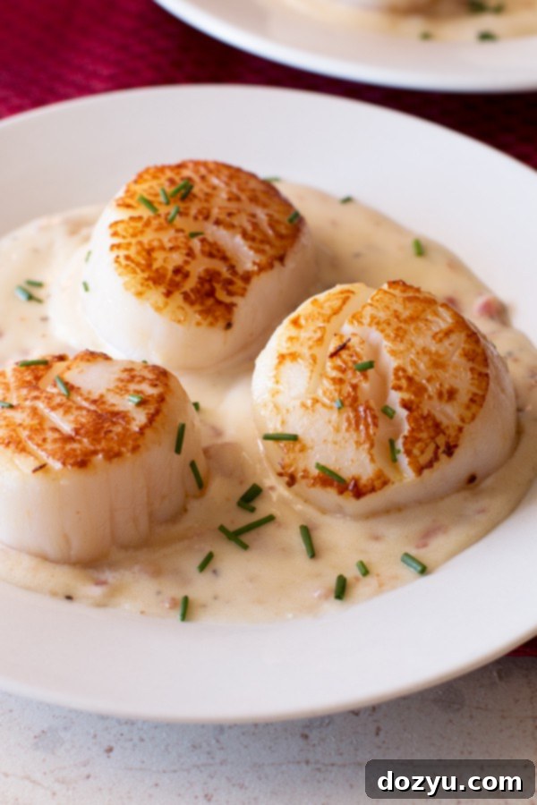 Golden Seared Scallops with Smoky Bacon Cream 7 plate of seafood with bacon cream sauce image