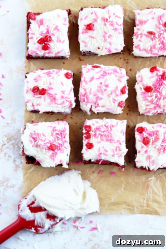 Sparkling Champagne Cream Cheese Frosting 6 Overhead picture of freshly frosted brownies with champagne cream cheese frosting and a sprinkle of edible glitter.