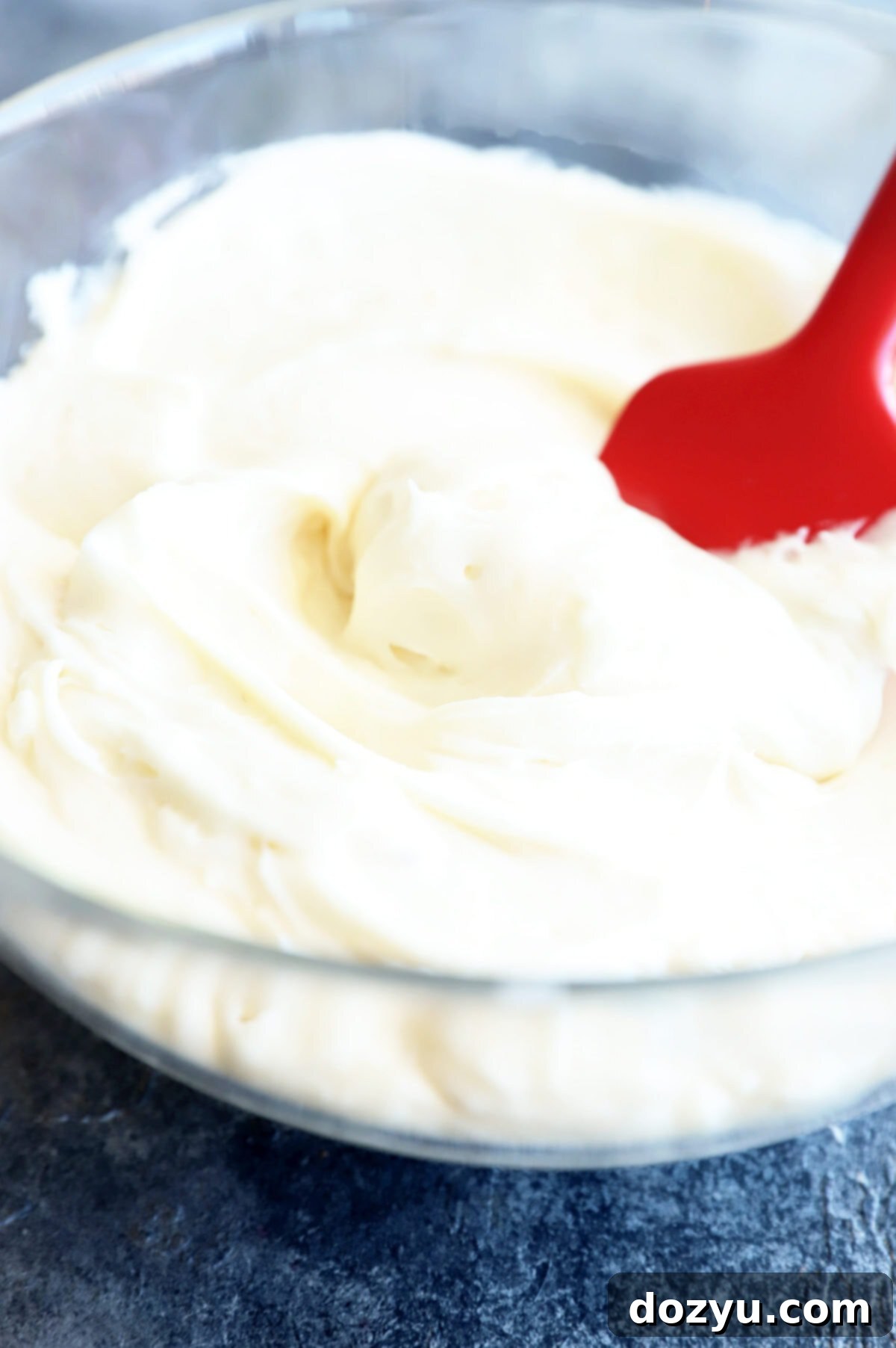 Sparkling Champagne Cream Cheese Frosting 7 Close up picture of champagne frosting in a bowl