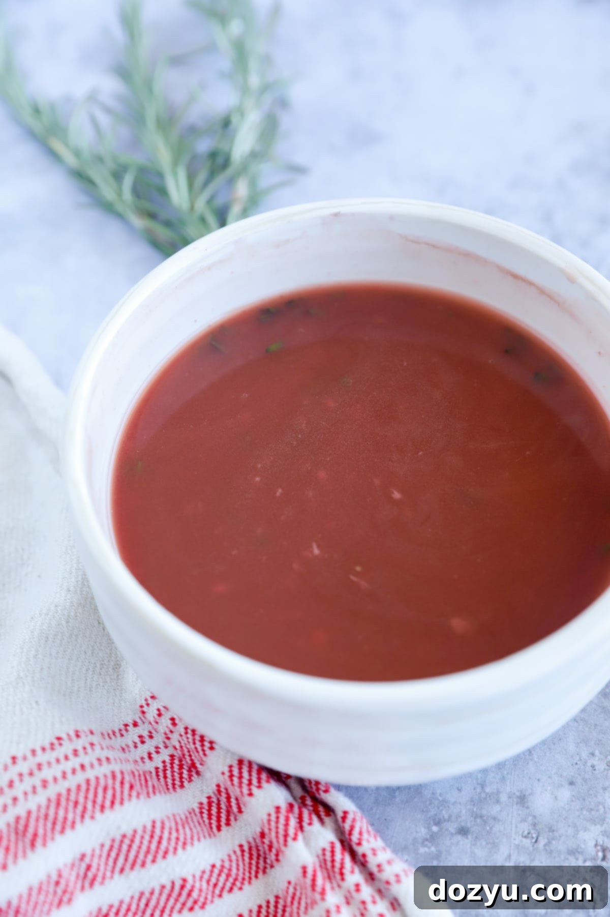 Velvet Red Wine Jus 8 Red Wine Jus in a bowl picture