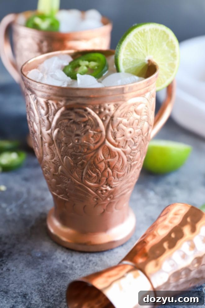 Ginger beer tequila cocktail in copper mug image