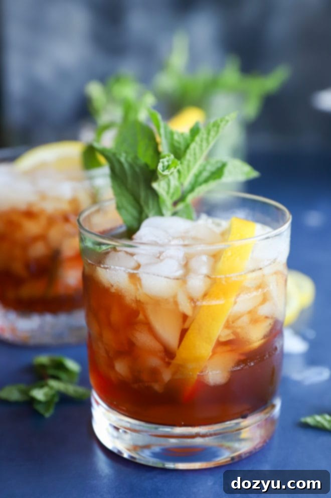 Southern Sweet Tea Mint Julep Punch 6 Side photo of tea cocktail in a glass with mint