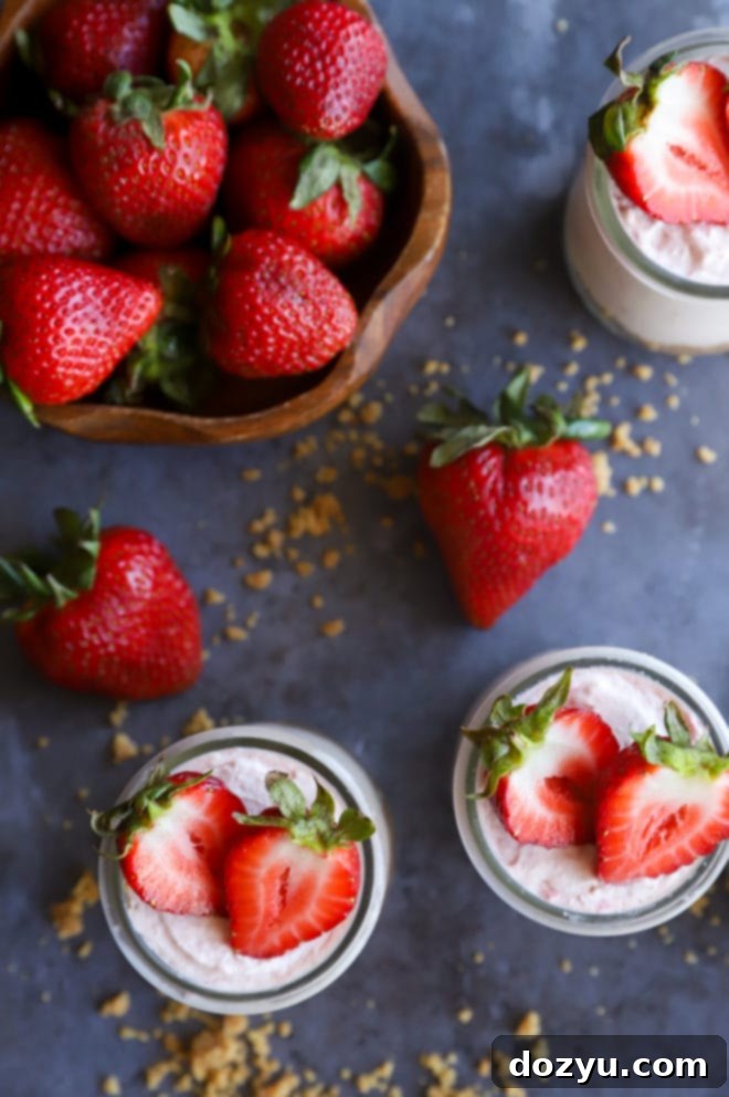 Whipped Strawberry Cheesecake Dream 2 Jars with strawberry desserts and fresh strawberries