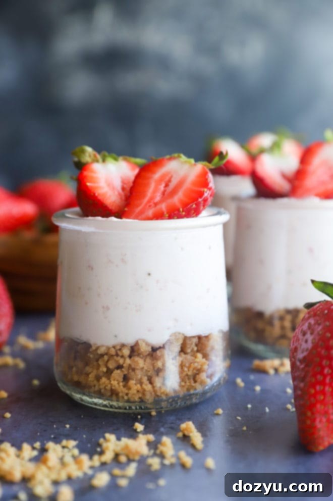 Whipped Strawberry Cheesecake Dream 7 Side photo of cheesecake mousse in jars