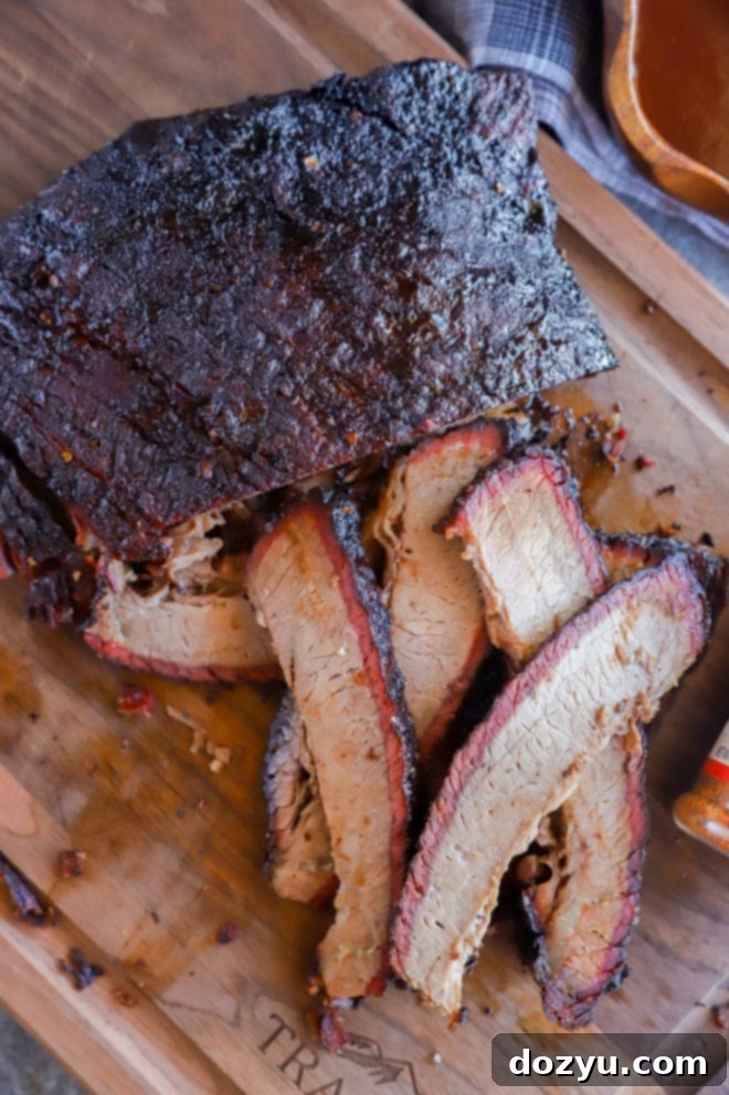 Effortless Traeger Smoked Brisket 2 pile of sliced beef brisket picture