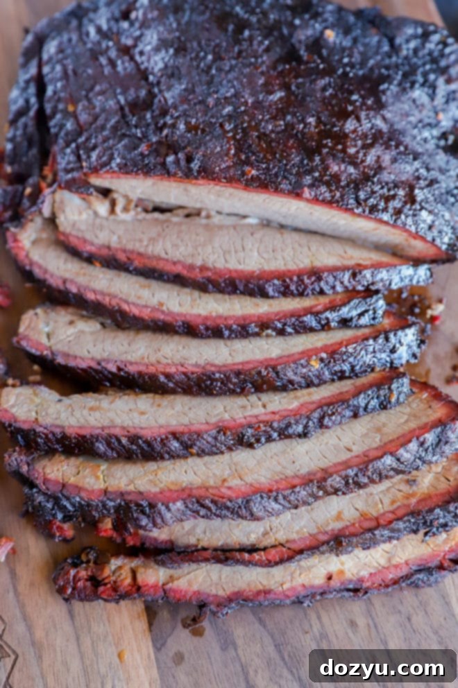 Effortless Traeger Smoked Brisket 4 Overhead image of traeger brisket on cutting board