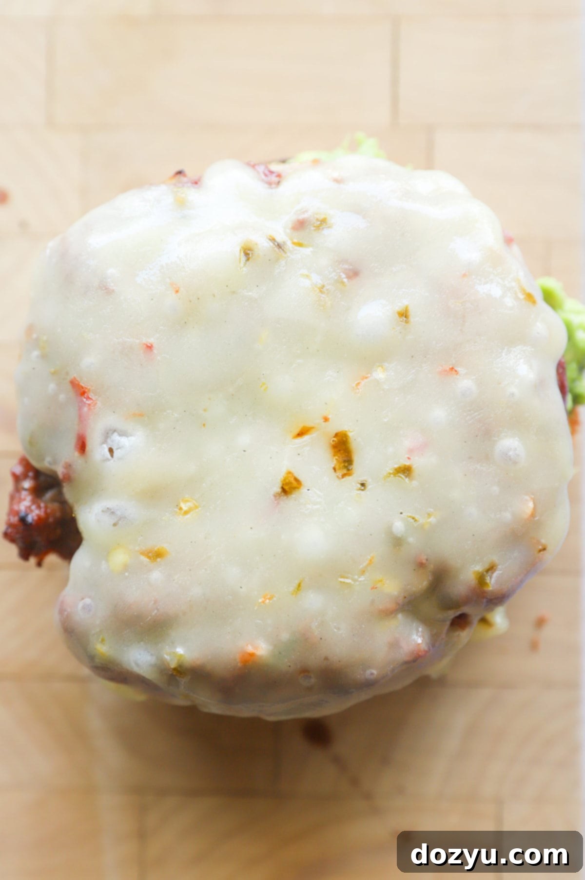 Fiery Salsa Jalapeño Crunch Burger 7 Burger with cheese on bun picture