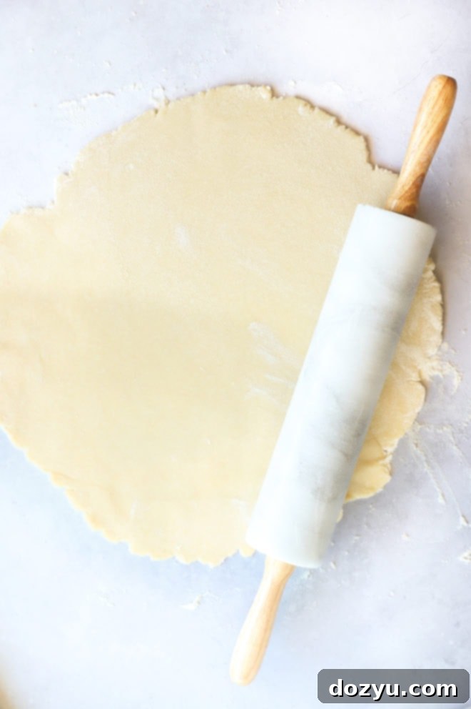 Perfecting Your Galette Dough 2 Rolling out galette dough with rolling pin picture