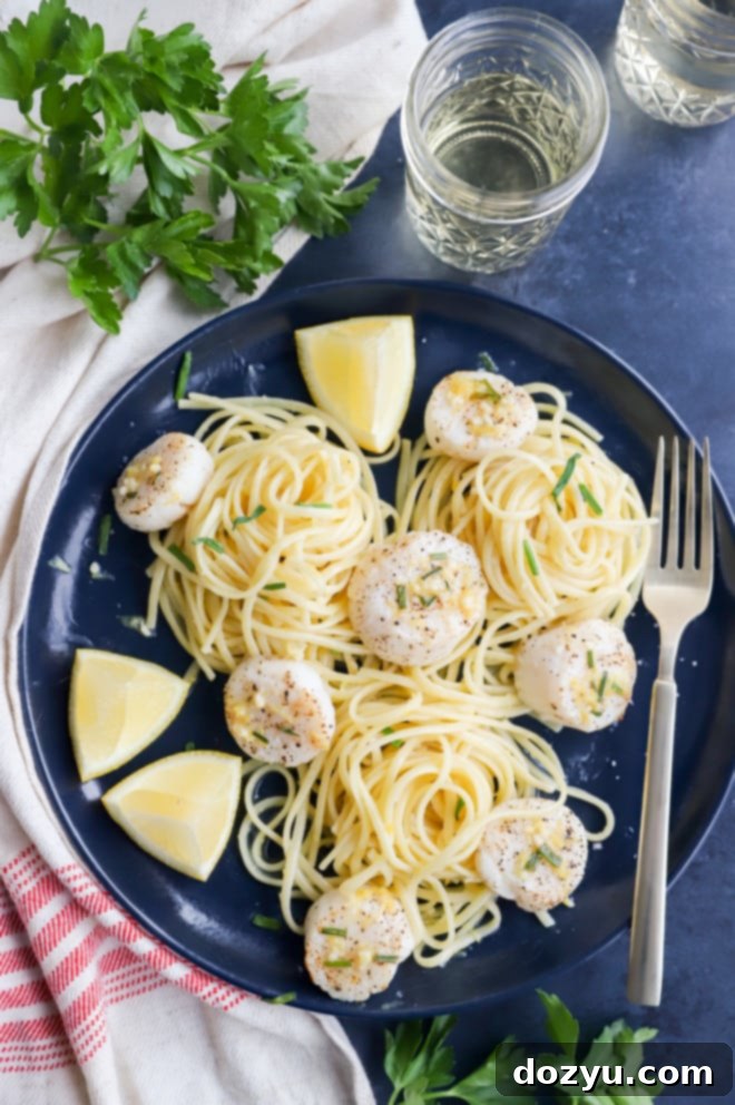 Effortless Air Fryer Scallops with Bright Chive Lemon Butter 2 Plump air-fried scallops drizzled with chive lemon butter