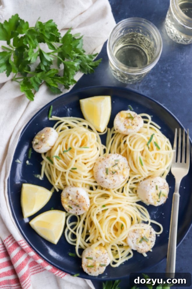Effortless Air Fryer Scallops with Bright Chive Lemon Butter 9 Overhead picture of air fryer scallops with pasta and chive lemon butter