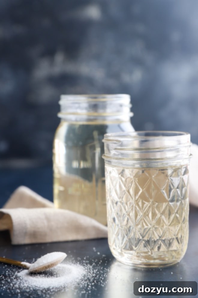 Easy Homemade Simple Syrup 9 Simple syrup in jars with sugar picture
