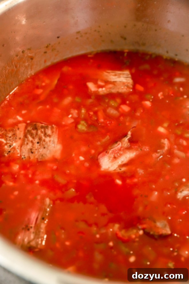 Fall-Off-The-Bone Instant Pot Short Rib Ragu 7 Sprigs of fresh thyme and bay leaves, key herbs for infusing the short rib ragu with flavor.