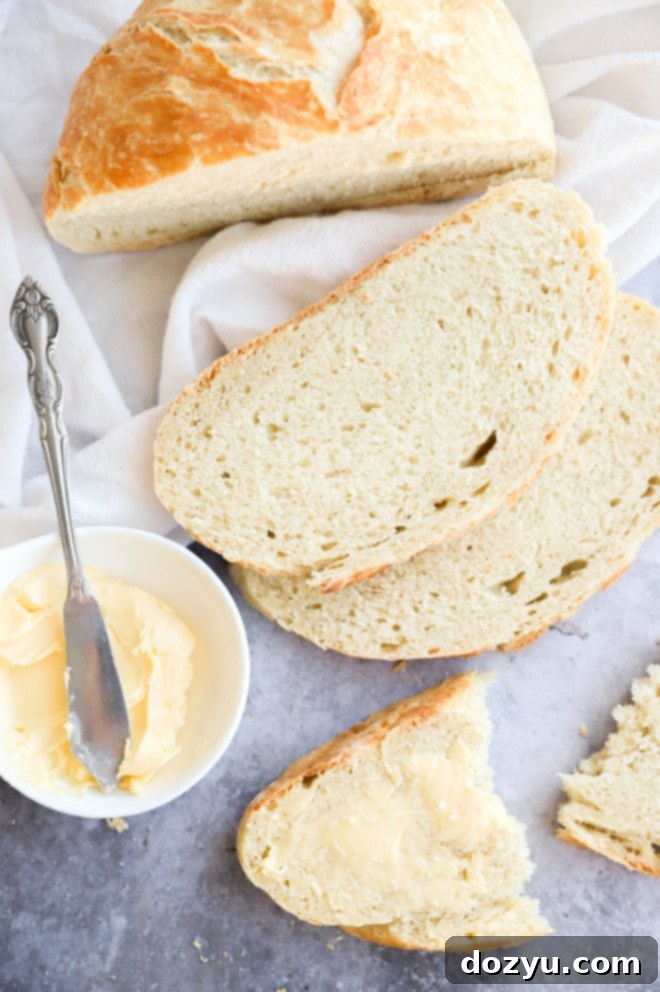 Effortless Overnight No Knead Bread 8 Butter and salt in a slice of overnight bread