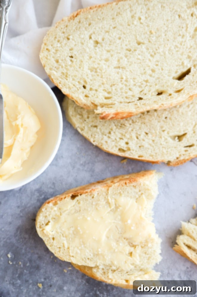 Effortless Overnight No Knead Bread 5 Bread slices with butter and salt picture