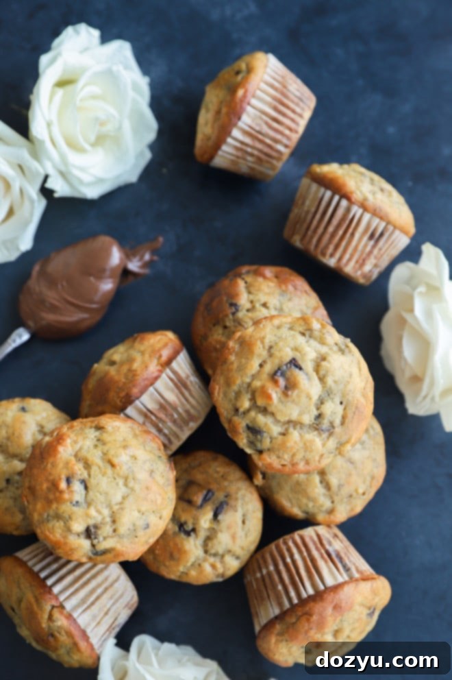 Decadent One-Bowl Banana Nutella Muffins 9 Baked breakfast goodies with flowers and chocolate hazelnut spread