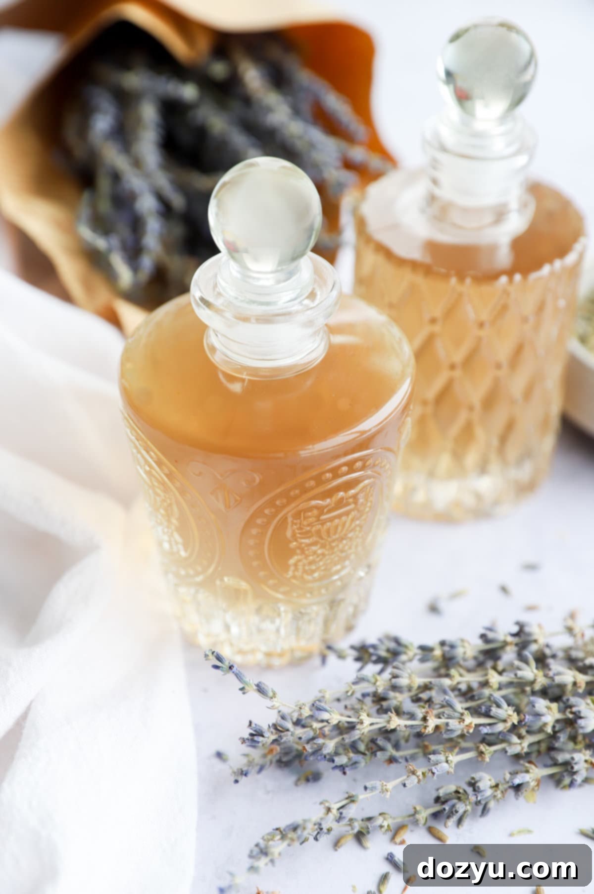 Fragrant Lavender Syrup 8 Lavender simple syrup in elegant glass bottles, ready to enhance drinks and desserts.