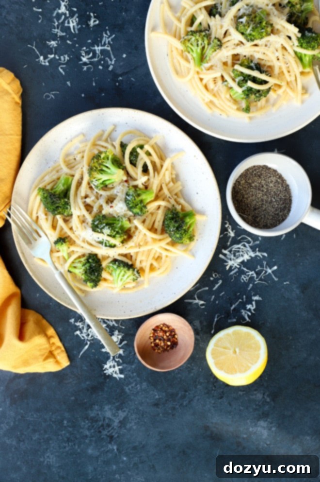 Vibrant Bucatini Cacio e Pepe with Broccoli 7 Overhead image of plated bucatini cacio e pepe with broccoli