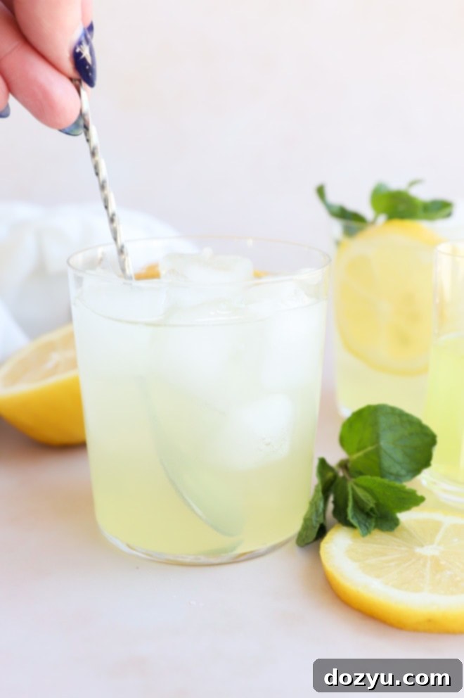 Limoncello Spritz 4 Close-up image of ingredients: limoncello, prosecco, and sparkling water, ready to be mixed