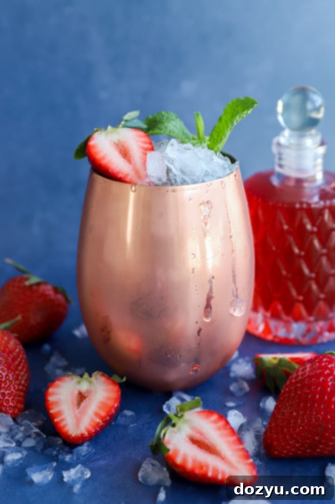 Homemade Strawberry Simple Syrup 4 Picture of strawberry cocktail with fruity simple syrup in jar