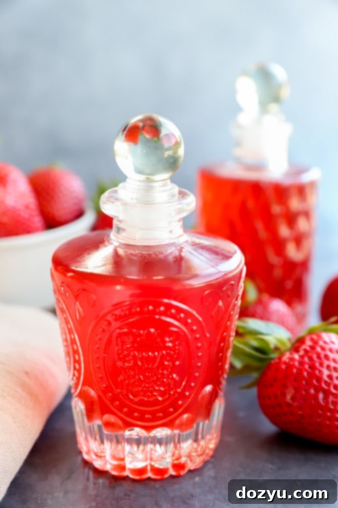 Homemade Strawberry Simple Syrup 9 Photo of syrup in bottles with fresh fruit