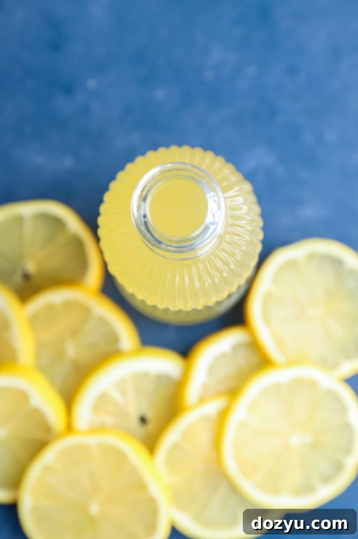 Zesty Lemon Syrup 10 lemon simple syrup in jar overhead image