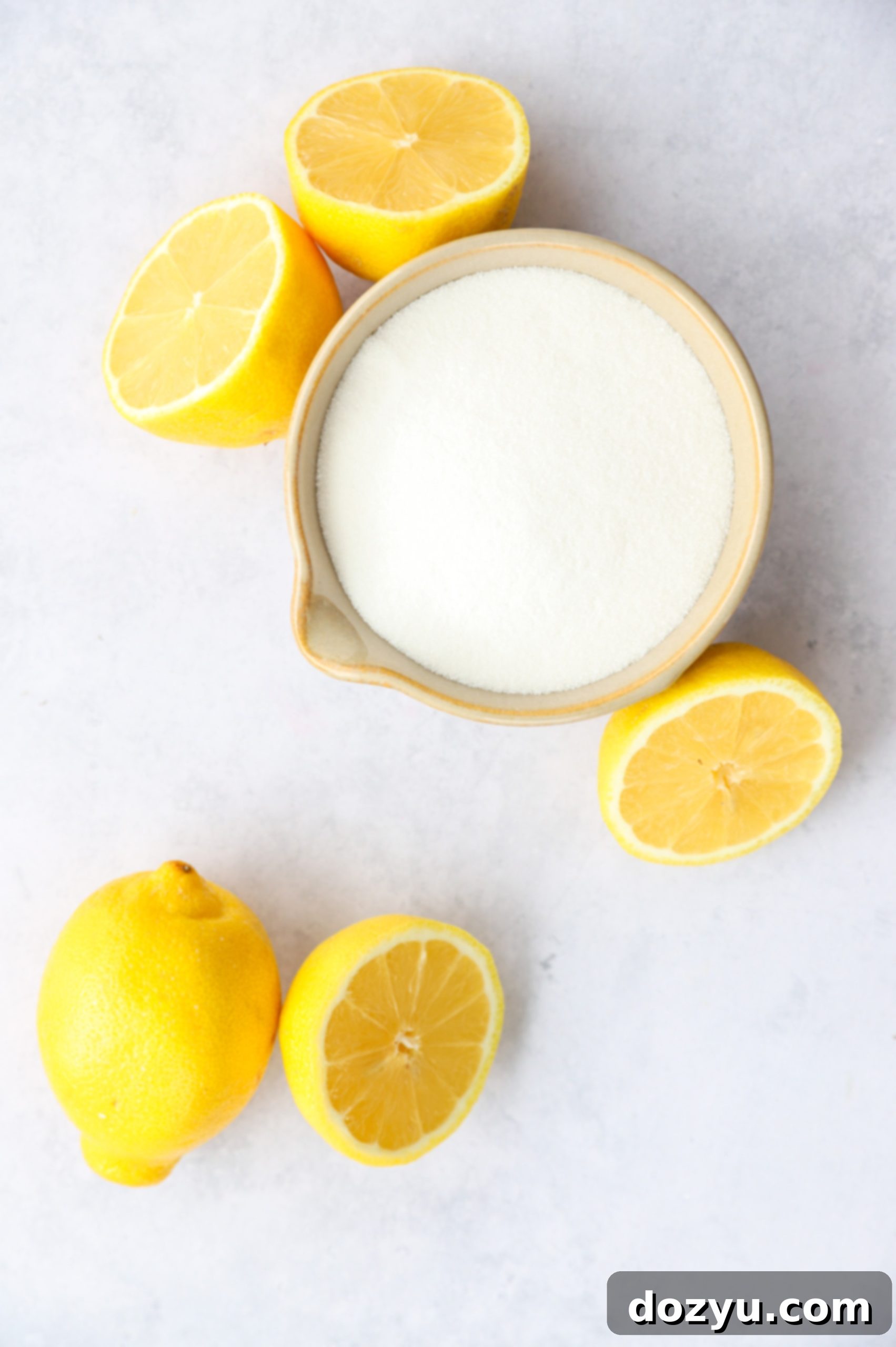 Zesty Lemon Syrup 4 Overhead image of ingredients for lemon simple syrup