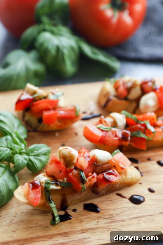 Caprese Bruschetta 11 Picture of summer tomato appetizer on platter
