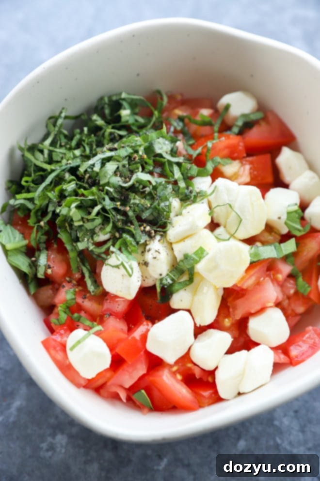 Caprese Bruschetta 6 Picture of caprese bruschetta in a bowl before stirring