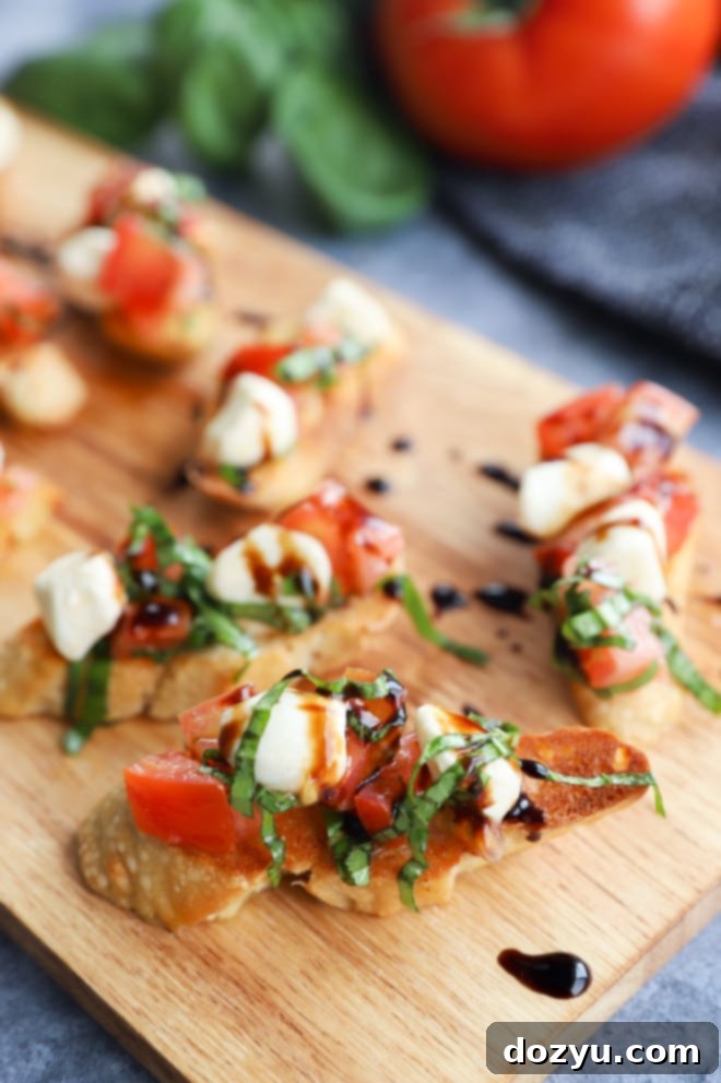 Caprese Bruschetta 7 Caprese bruschetta on serving platter image